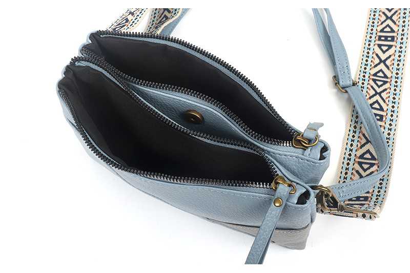 I'm Dutch schoudertasje Evian met brede schouderband blauw blue PU materiaal